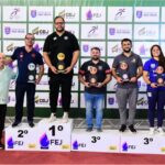 Pódio com representantes das equipes campeãs da disputa masculina